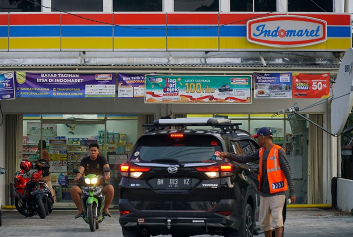 Walikota Pekanbaru Akan Hapus Pungutan Parkir Indomaret Alfamart