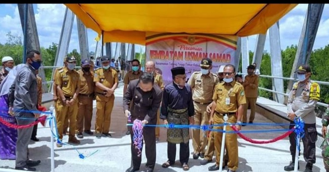 Bupati Irwan Resmikan Jembatan Usman Samad Sungai Tohor, Menyusul Esok Listrikpun Akan Terang Bender