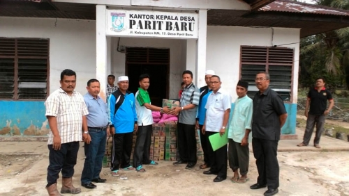 PTPN V Peduli Korban Banjir, 2,8 Ton Beras Dibagikan di Kampar