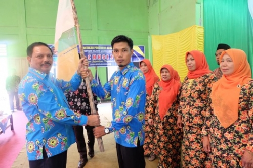 Peduli Kebakaran di Asrama Polisi Tembilahan, Pj Bupati Serahkan Bantuan dari Baznas Inhil