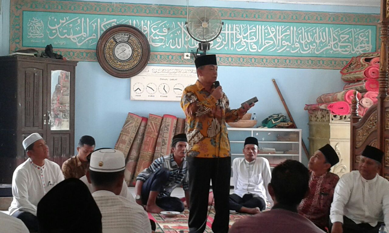 Bupati Harris Disambut Makan Bajambau Desa Tanjung Balam Siak Hulu.